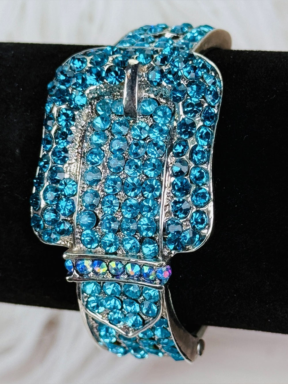 Aged Silvertone, blue stone bling, hinged buckle weighted bracelet